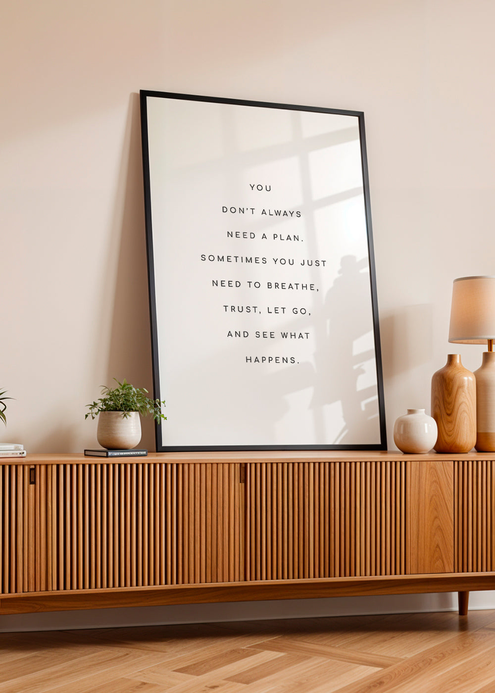 Minimalistyczny plakat z cytatem typograficznym