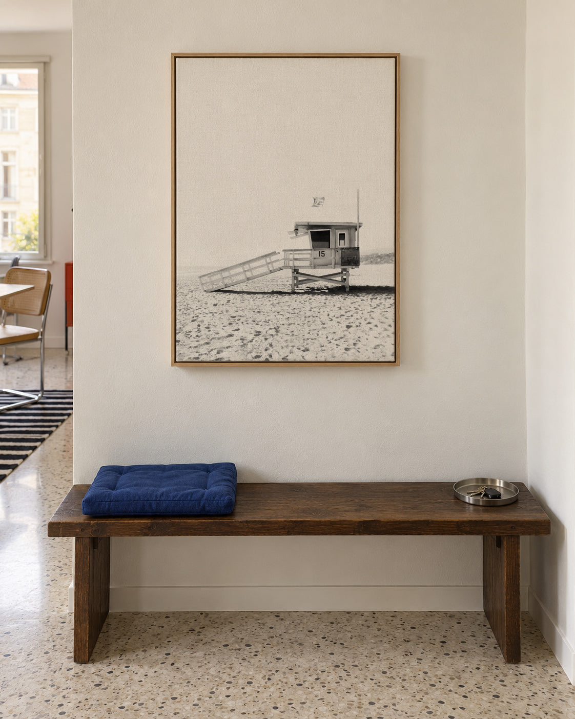 Beach hut BW - Framed canvas in an interior