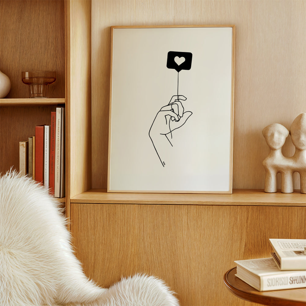 Minimalistyczna ilustracja ręki z bańką serca