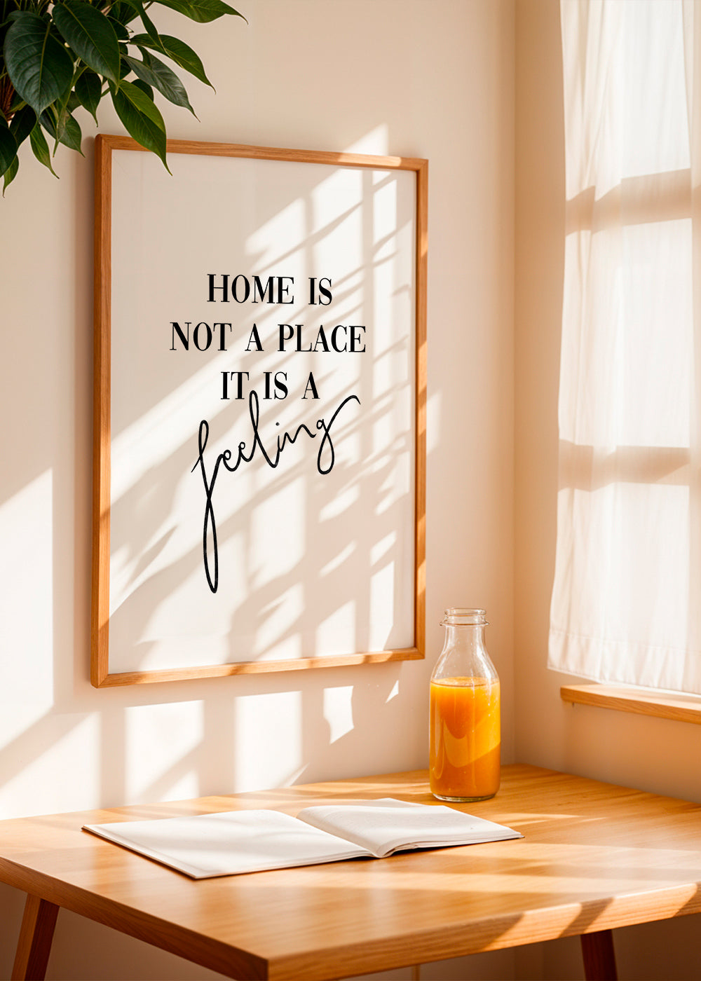 Czarno-biała grafika z cytatem typograficznym "Home is a feeling"