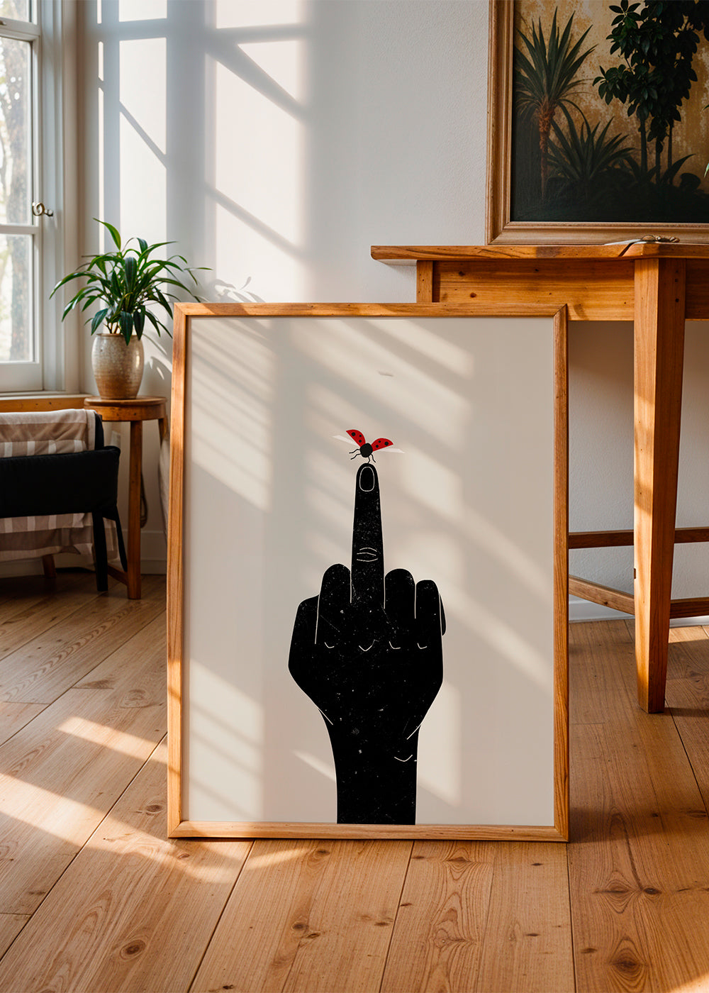 Ilustracja biedronki na uniesionym palcu