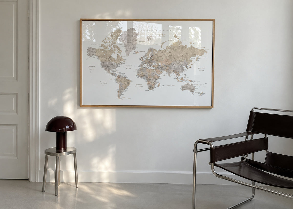Detailed taupe watercolor world map with labels in Spanish, Abey - Framed poster in an interior