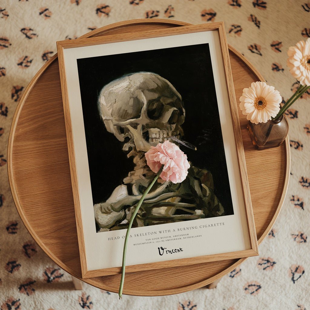 Vicent Van Gogh - Head of a skeleton with a burning cigarette - Framed poster in an interior