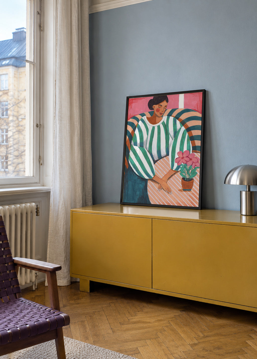 Woman in stripes in thought - Framed poster in an interior
