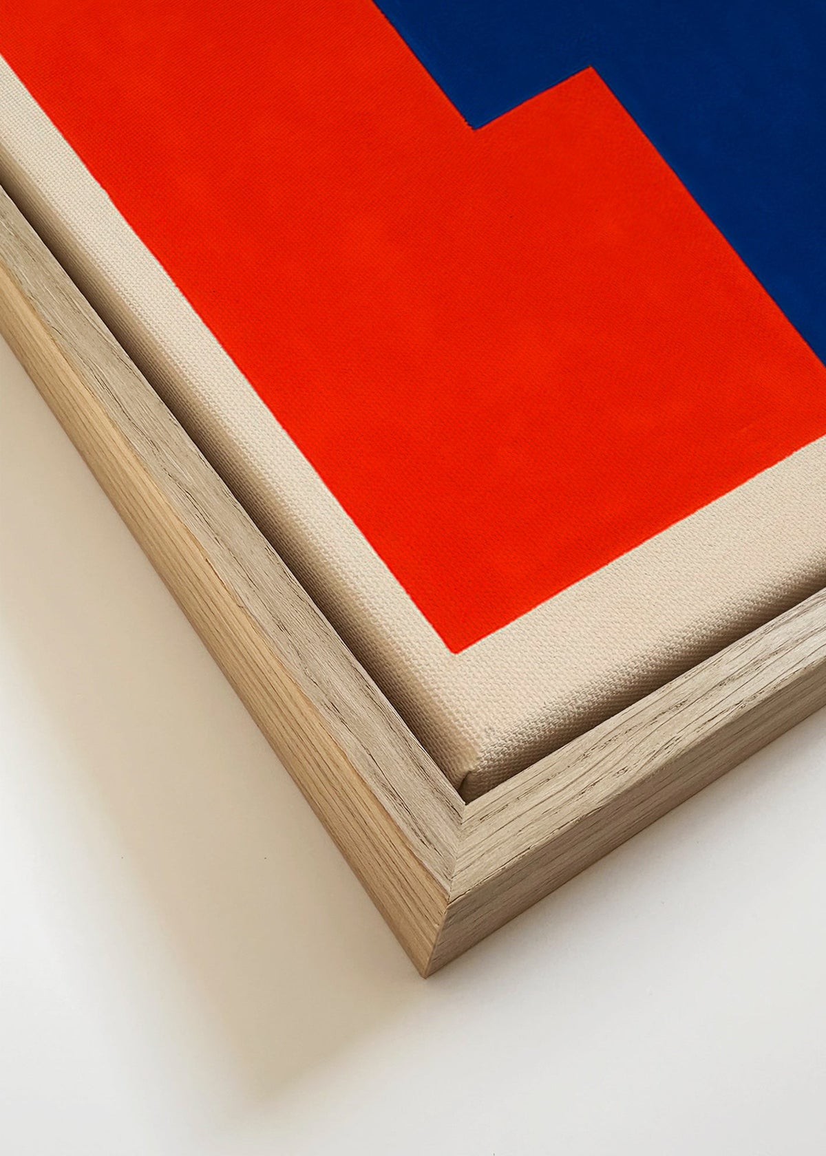 Obraz abstrakcyjny z czerwonymi i niebieskimi blokami – Canvas detail