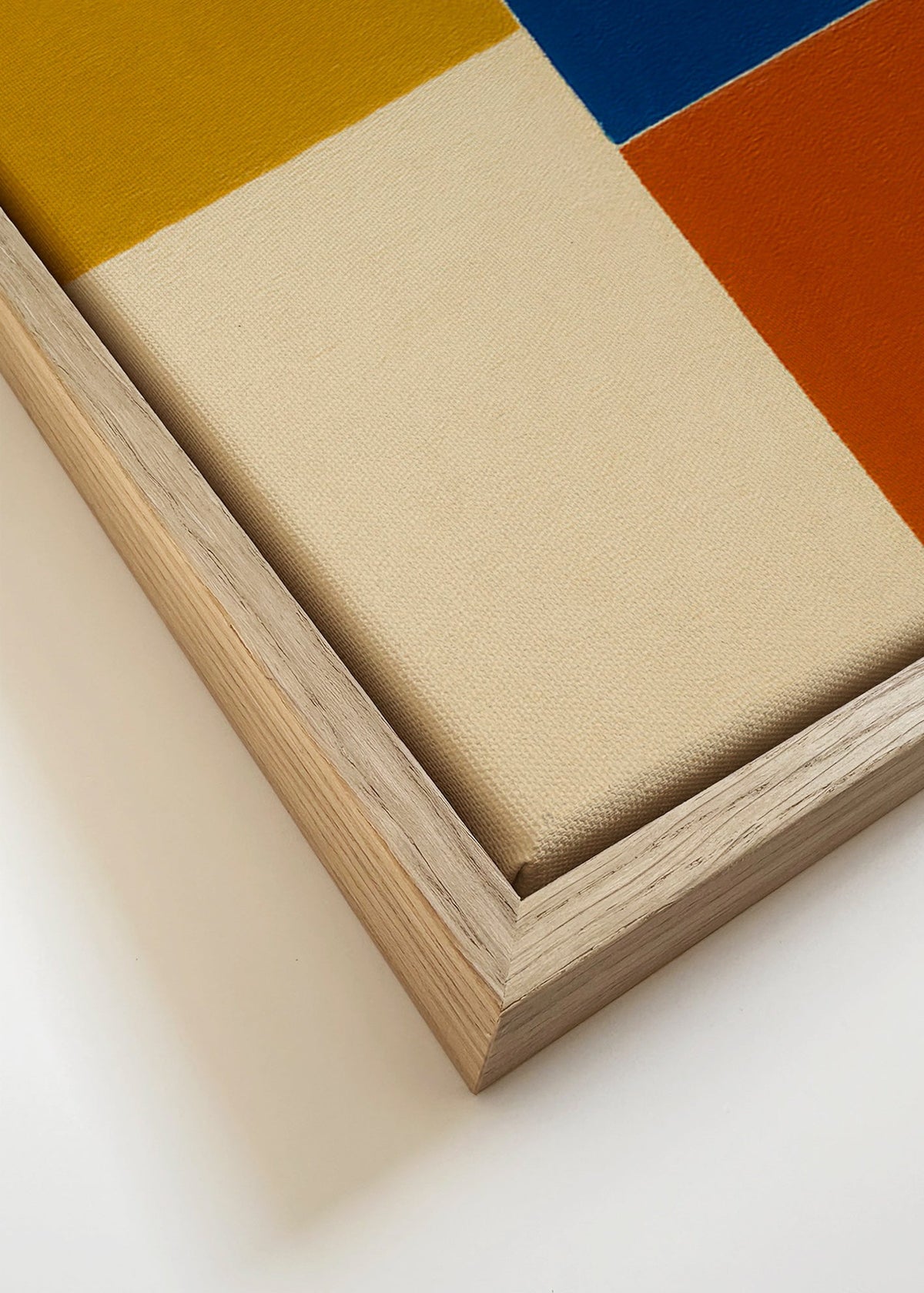 Abstrakcyjne dzieło z musztardowymi i niebieskimi blokami – Canvas detail