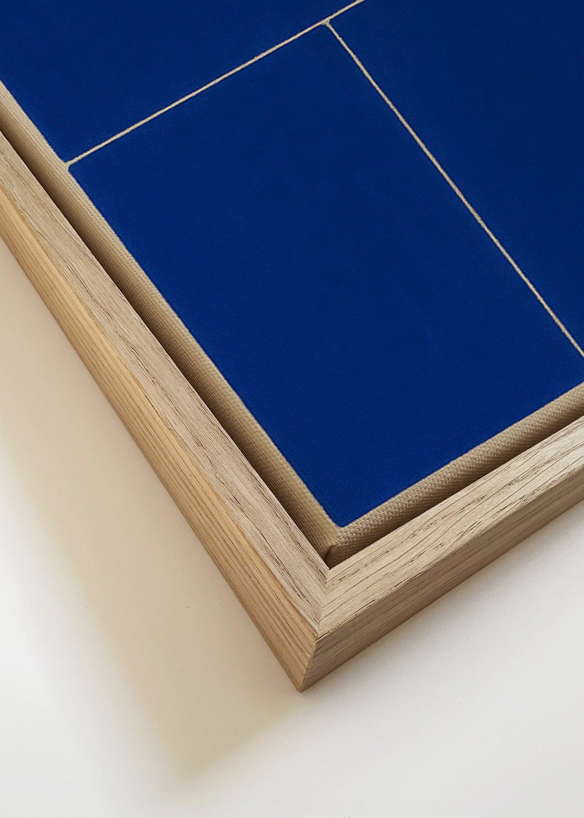 Obraz geometryczny z niebieskimi panelami – Canvas detail