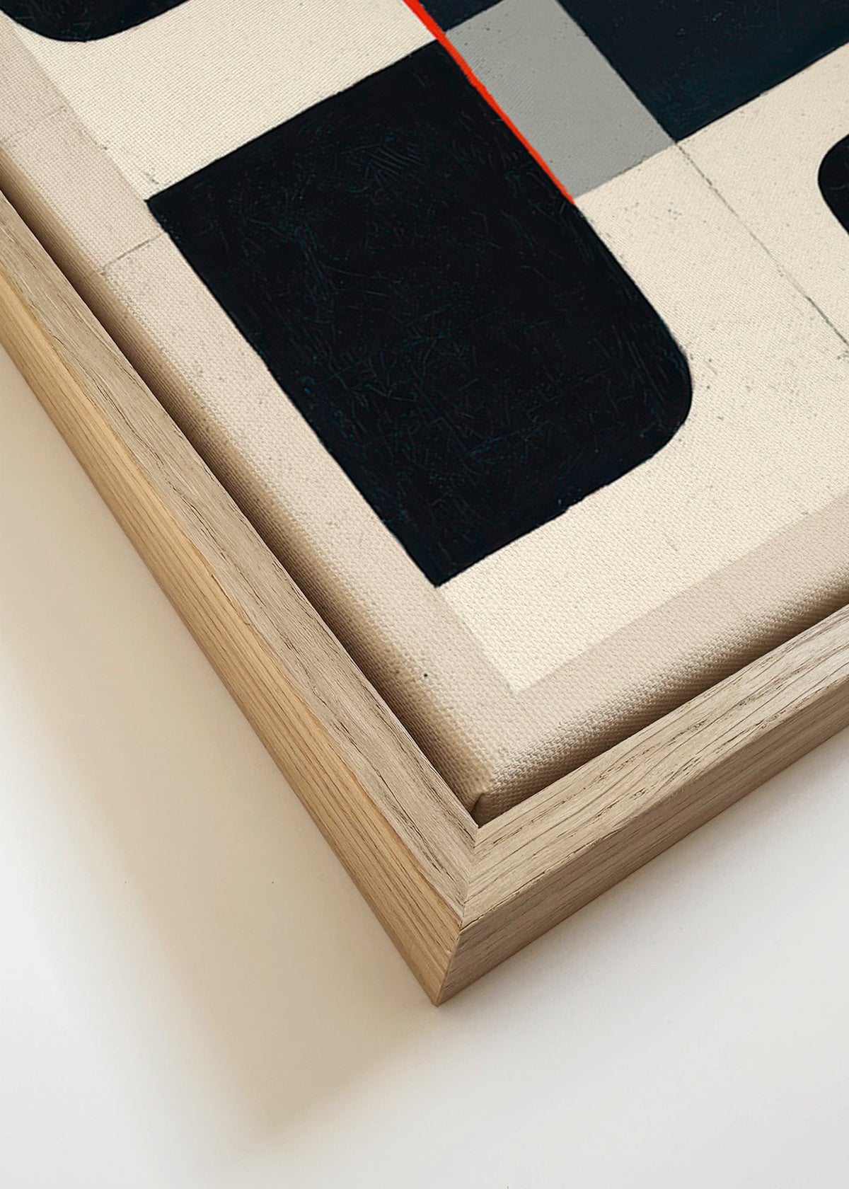 Plakat geometryczny z czarnymi blokami i czerwonym akcentem – Canvas detail
